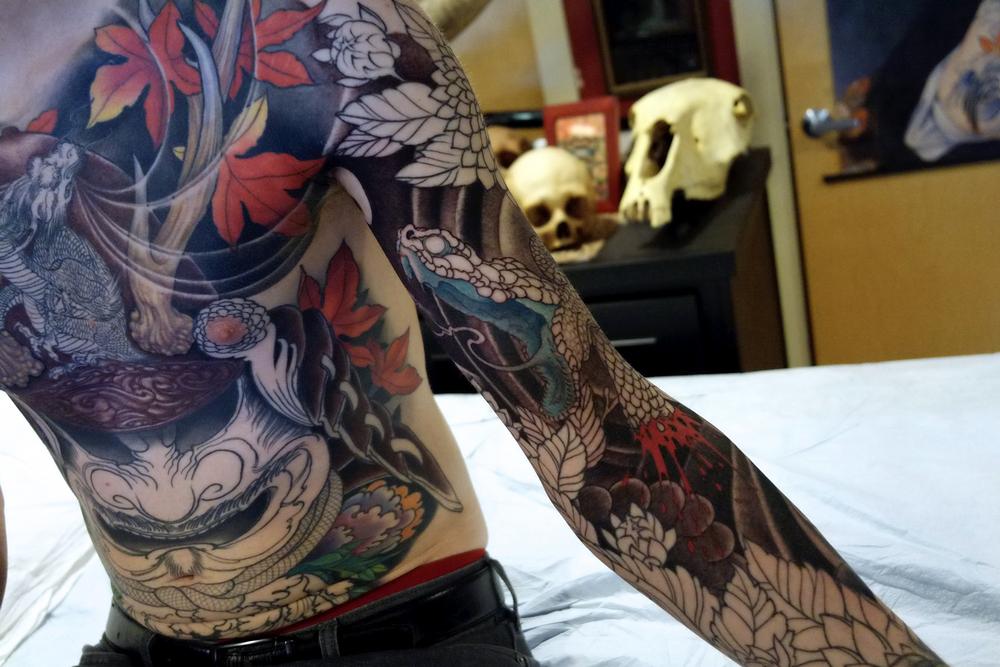 Tattoos - samurai and severed snake head - 114708
