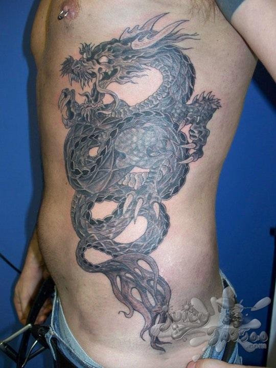 dragon side rib tattoos for men