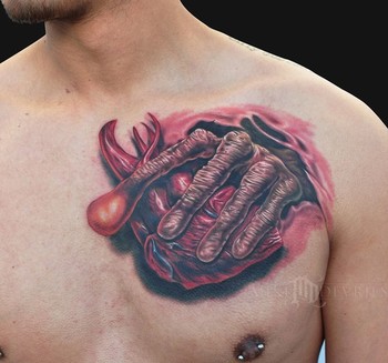 Mike DeVries - ET Hand Tattoo