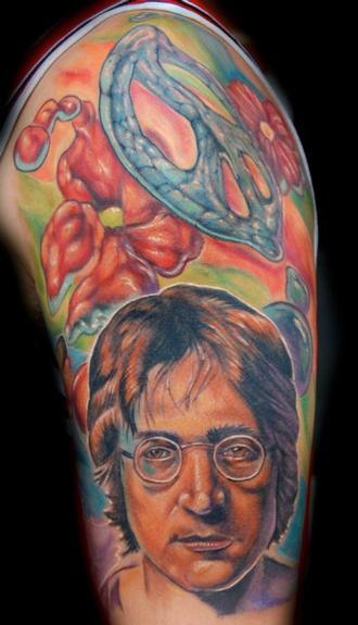 Evan Olin John Lennon from the Beatles peace half sleeve tattoo