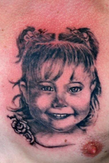 Traditional Black and Gray portrait tattoo