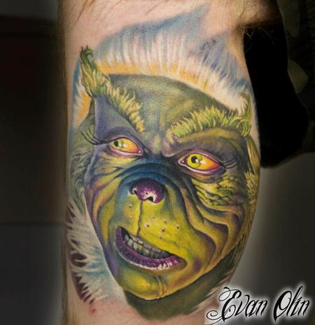 Evan Olin - Full color realistic Jim Carey Grinch tattoo
