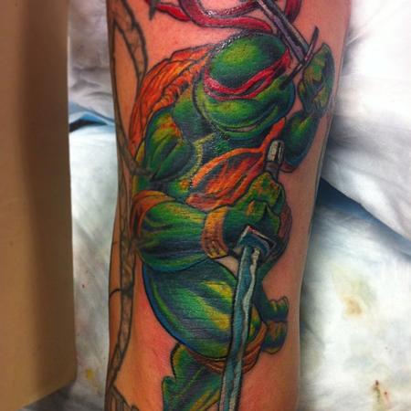 Right forearm tattoo of Leonardo, the ninja turtle, on