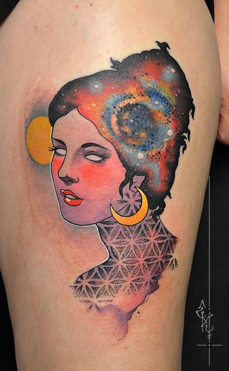 Geometric galaxy woman tattoo