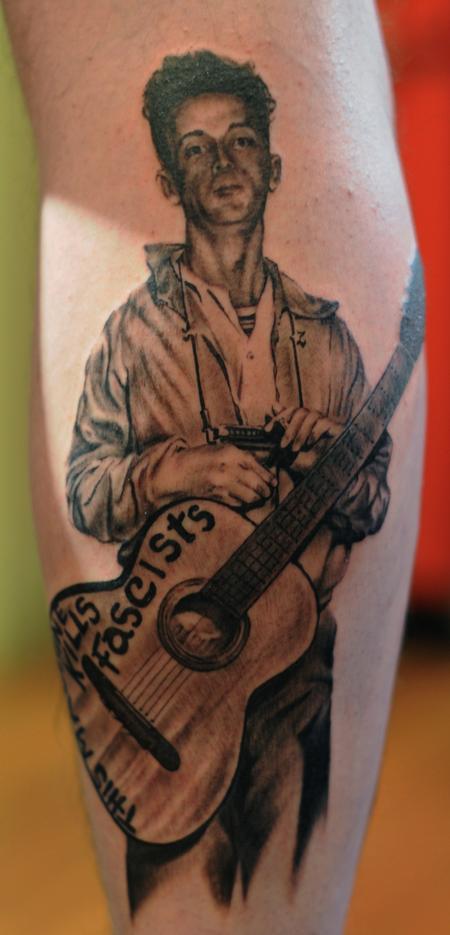 Tattoos - Woody Guthrie portrait tattoo - 84472