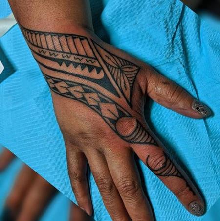 Bonnie Seeley - Bonnie Seeley Tribal Hand Tattoo