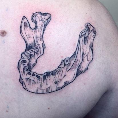 Tori Loke - Jawbone Tattoo