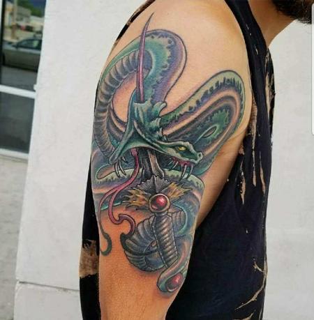 Cody Cook - Snake and Sword Tattoo