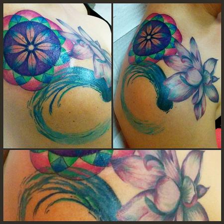 Tattoos - shoulder lotus, enso and geometric flower - 113712