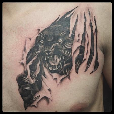 Tattoos - panther ripping through skin - 113752