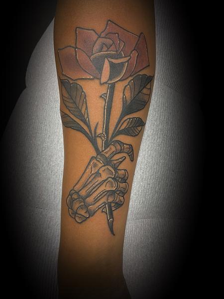 Nick Sadler - Skeleton Hand with Rose Tattoo