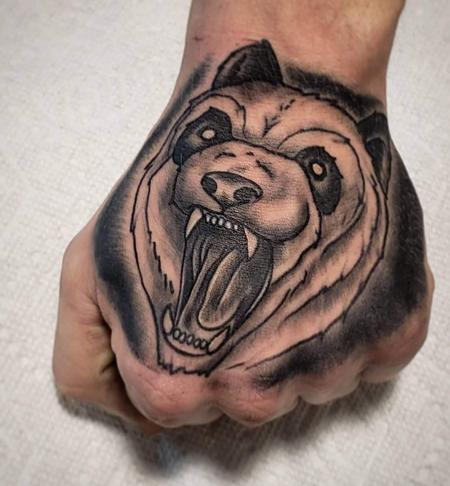 Blake Ohrt - Panda tattoo in hand