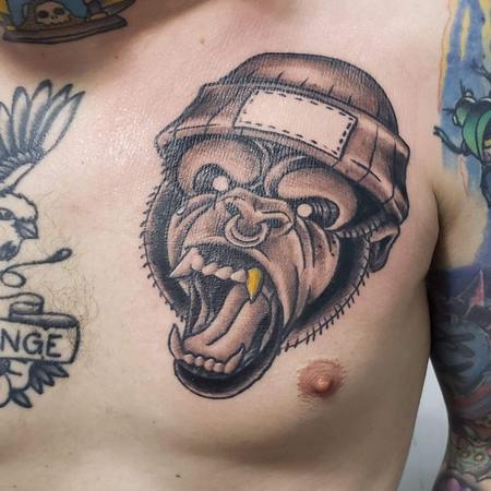 Blake Ohrt (MADISON) - New traditional gorilla with gold tooth tattoo on chest