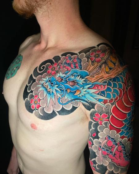 Boston Rogoz - Japanese dragon chest and half arm sleeve