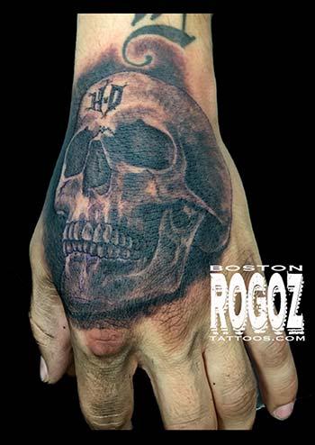 Boston Rogoz - HD hand skull tattoo