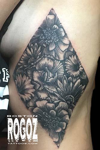 Tattoos - floral rib piece  - 119634