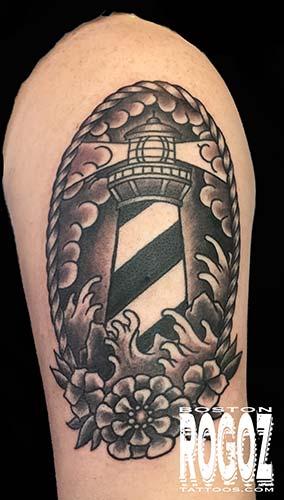Boston Rogoz - lighthouse tattoo