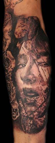 Boston Rogoz - tortured_girl_tattoo