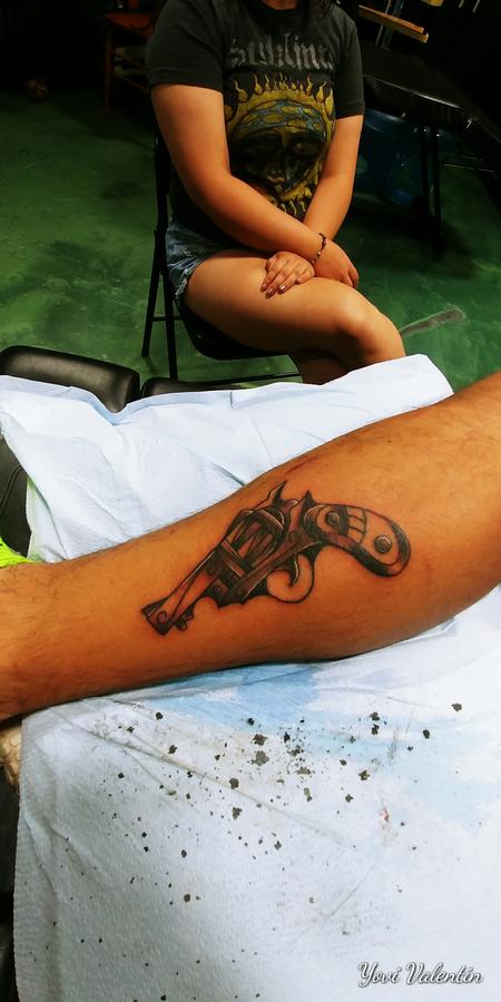 Yovanier Valentin - gun tattoo