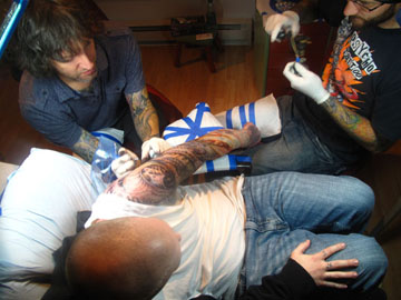 Evan Griffiths and Guy tattoo Josh