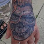 Tattoos - Skully Hand - 122701
