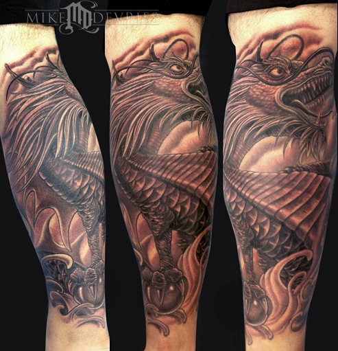 Realistic Dragon Tattoo On Man Left Bicep