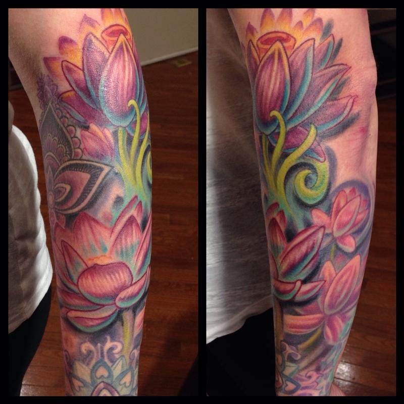 Lotus flowers by Phil Robertson Tattoos