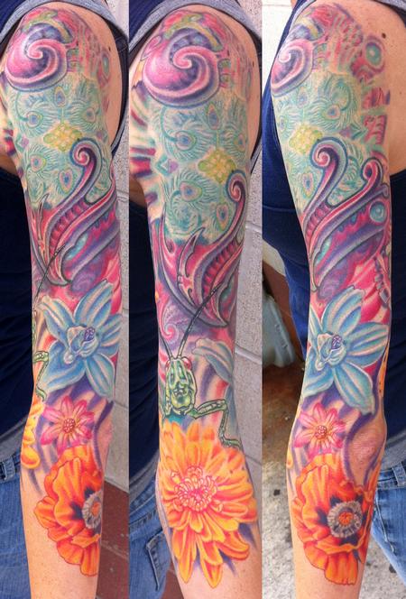 Phil Robertson - Flower and bio mech sleeve tattoo