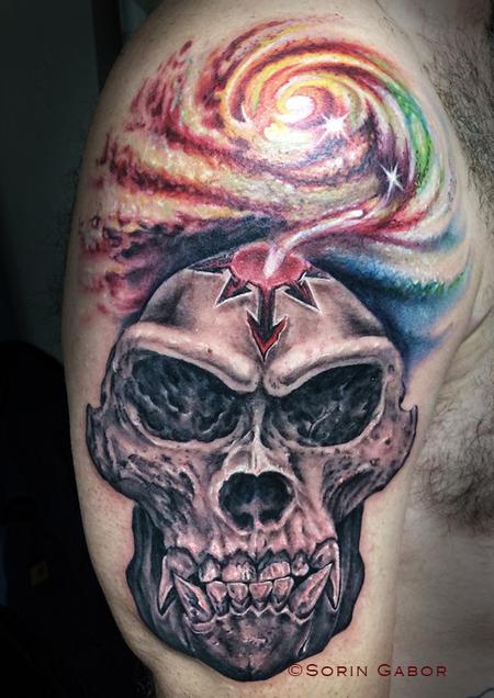 Tattoos - Realistic black and gray gorilla skull with color space tattoo - 120421