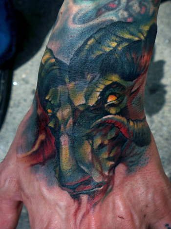 Tattoos - ram head on the hand - 31643