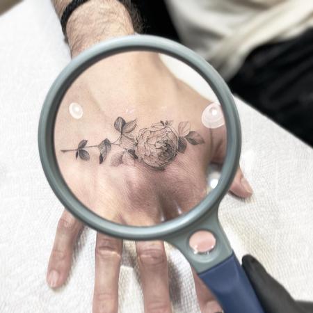 Hosang Lee - Tiny Realistic Rose Tattoo