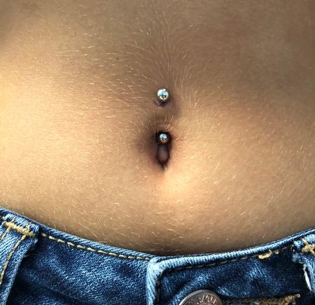 Katie Heisler - Navel piercing