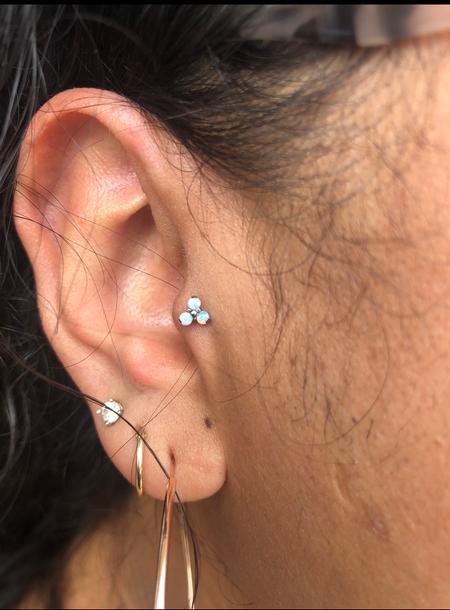 Katie Heisler - Tragus piercing